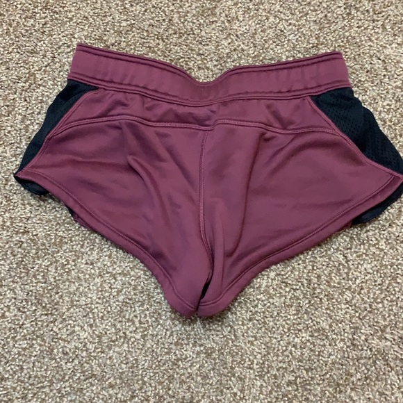 UA size S fitted, wine colored, polyester athletic shorts - Picture 2 of 2